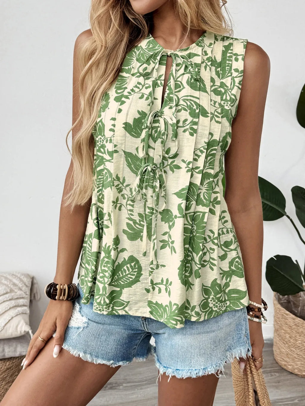 Printed Sleeveless Ruffle Peplum Blouse