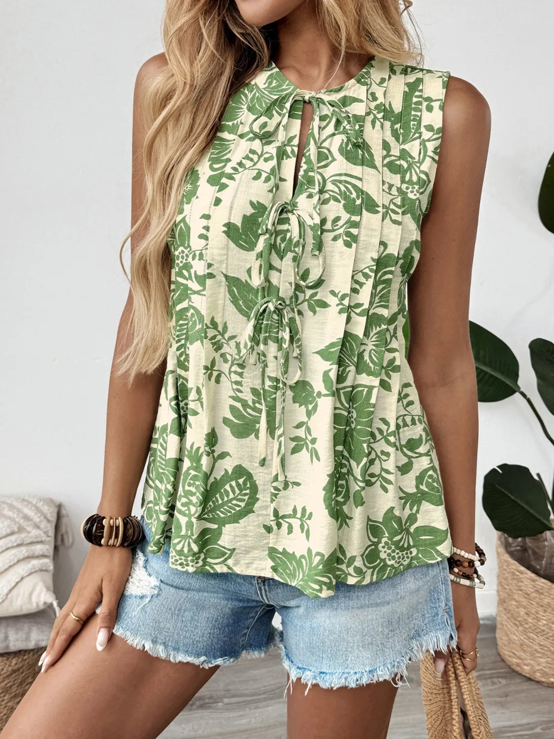 Printed Sleeveless Ruffle Peplum Blouse