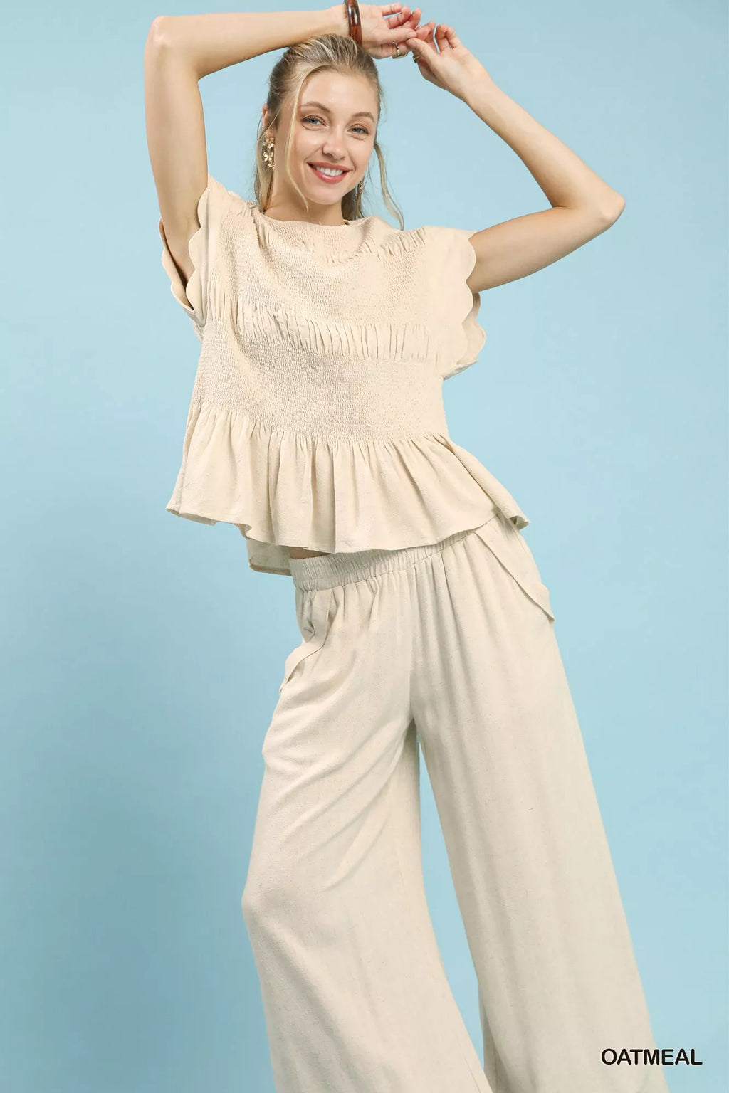 Umgee Linen Blend Smocked Peplum Blouse