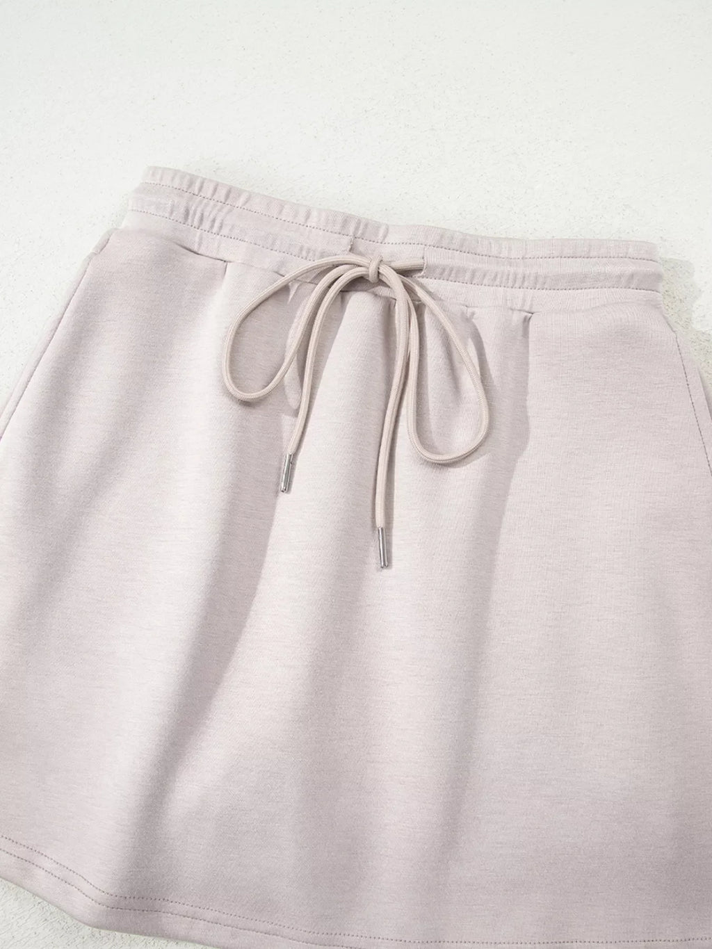 Solid Color Drop Shoulder Pullover and Drawstring Mini Skirt 2pcs Outfit