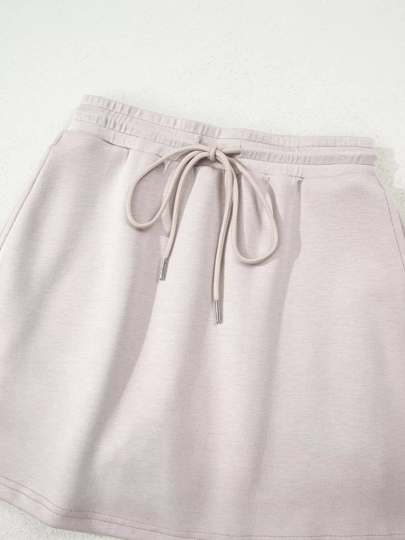 Solid Color Drop Shoulder Pullover and Drawstring Mini Skirt 2pcs Outfit