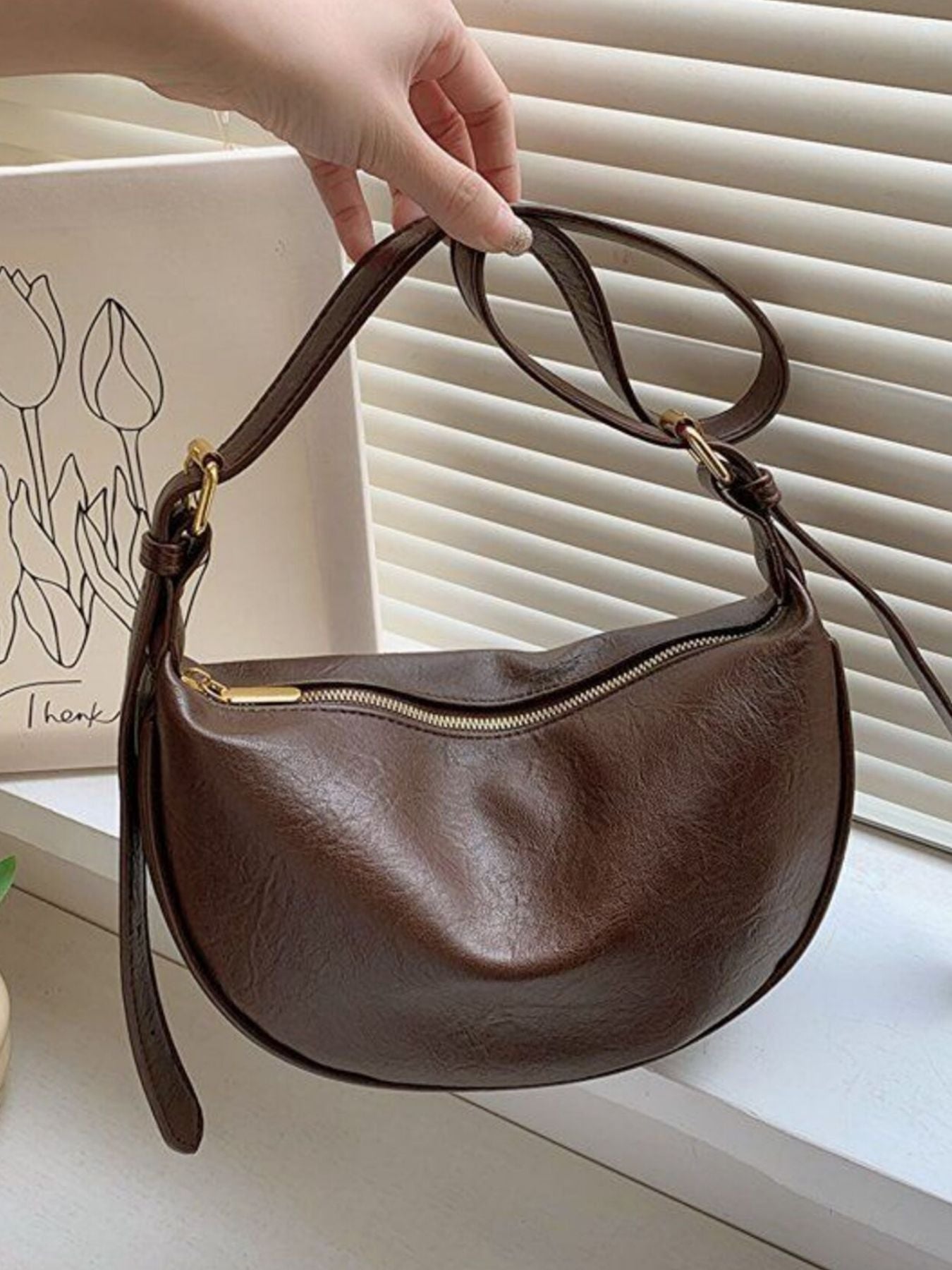 Crescent Shoulder Bag with Plush Charm