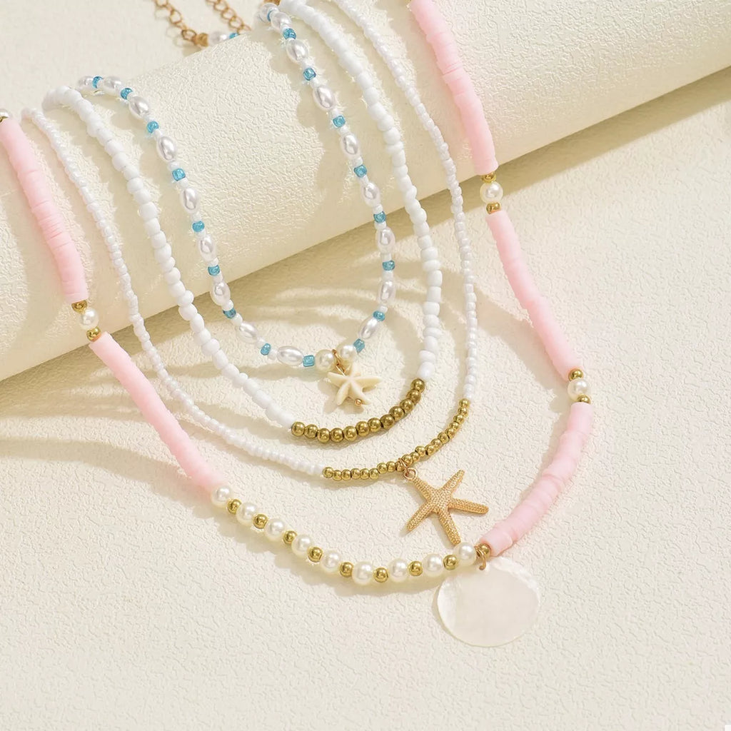 4 Piece Beaded Starfish Charm Necklace