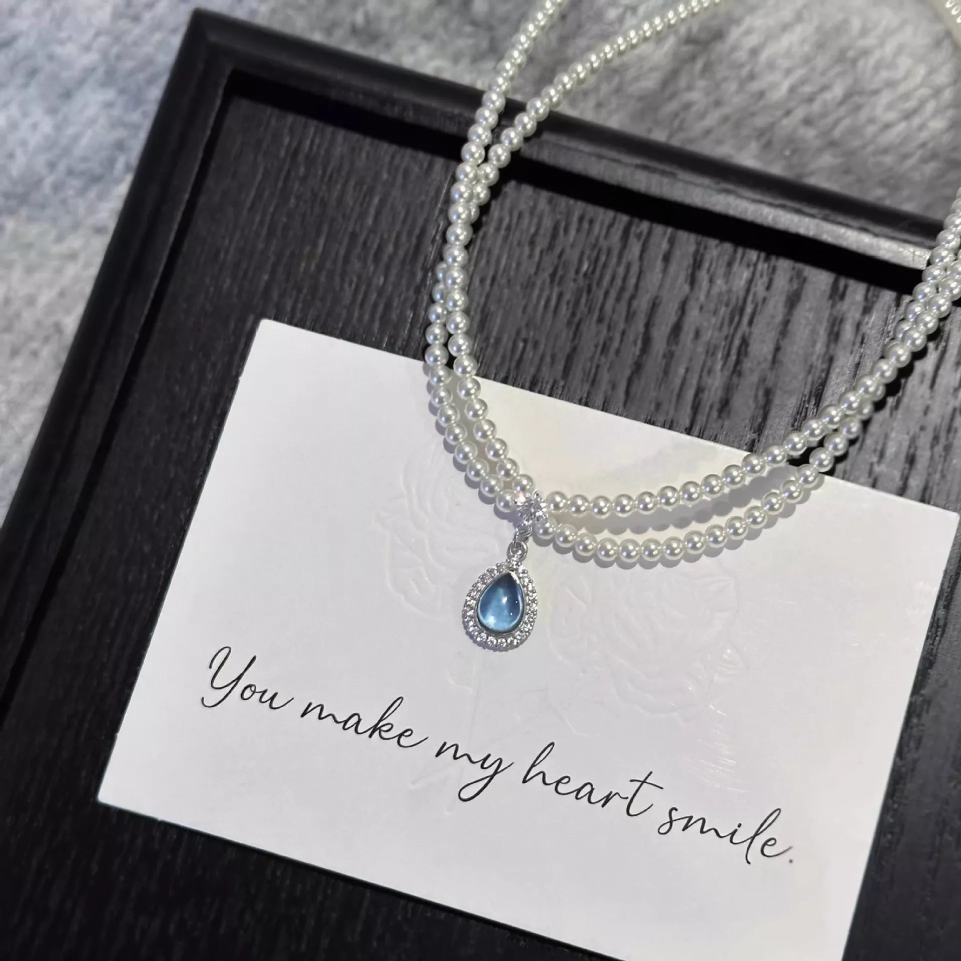 Double Layered Pearl Necklace with Teardrop Pendant