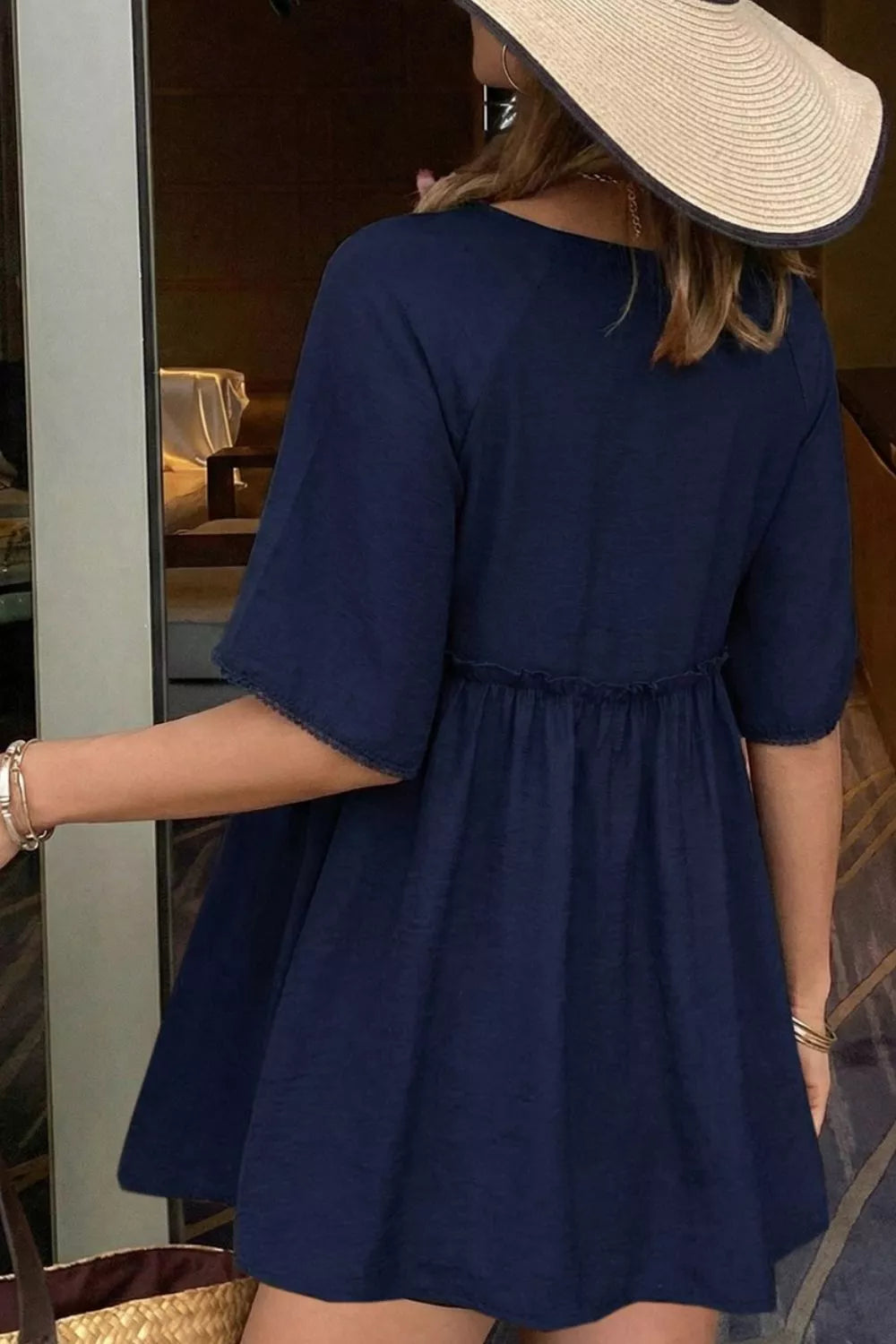 Ruffle Hem Tie Neck Blouse