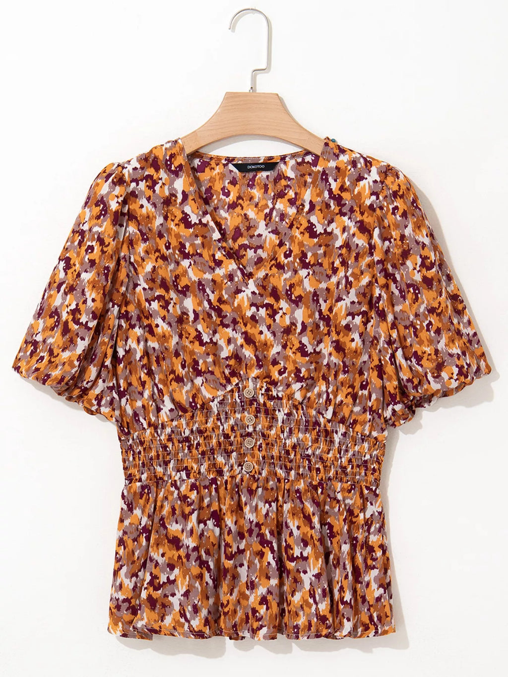 Abstract Print V Neck Smocked Babydoll Blouse