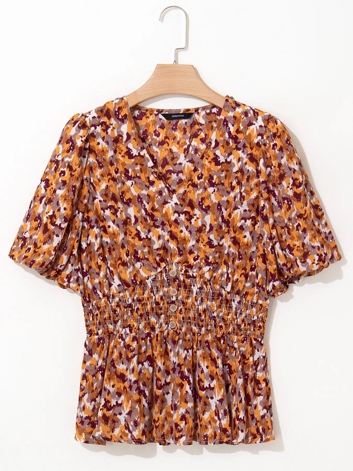 Abstract Print V Neck Smocked Babydoll Blouse