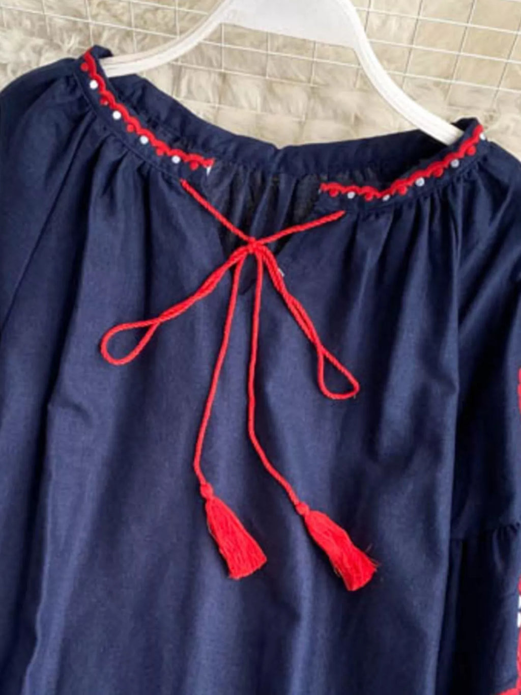 Embroidered Tassel Tie Neck Blouse