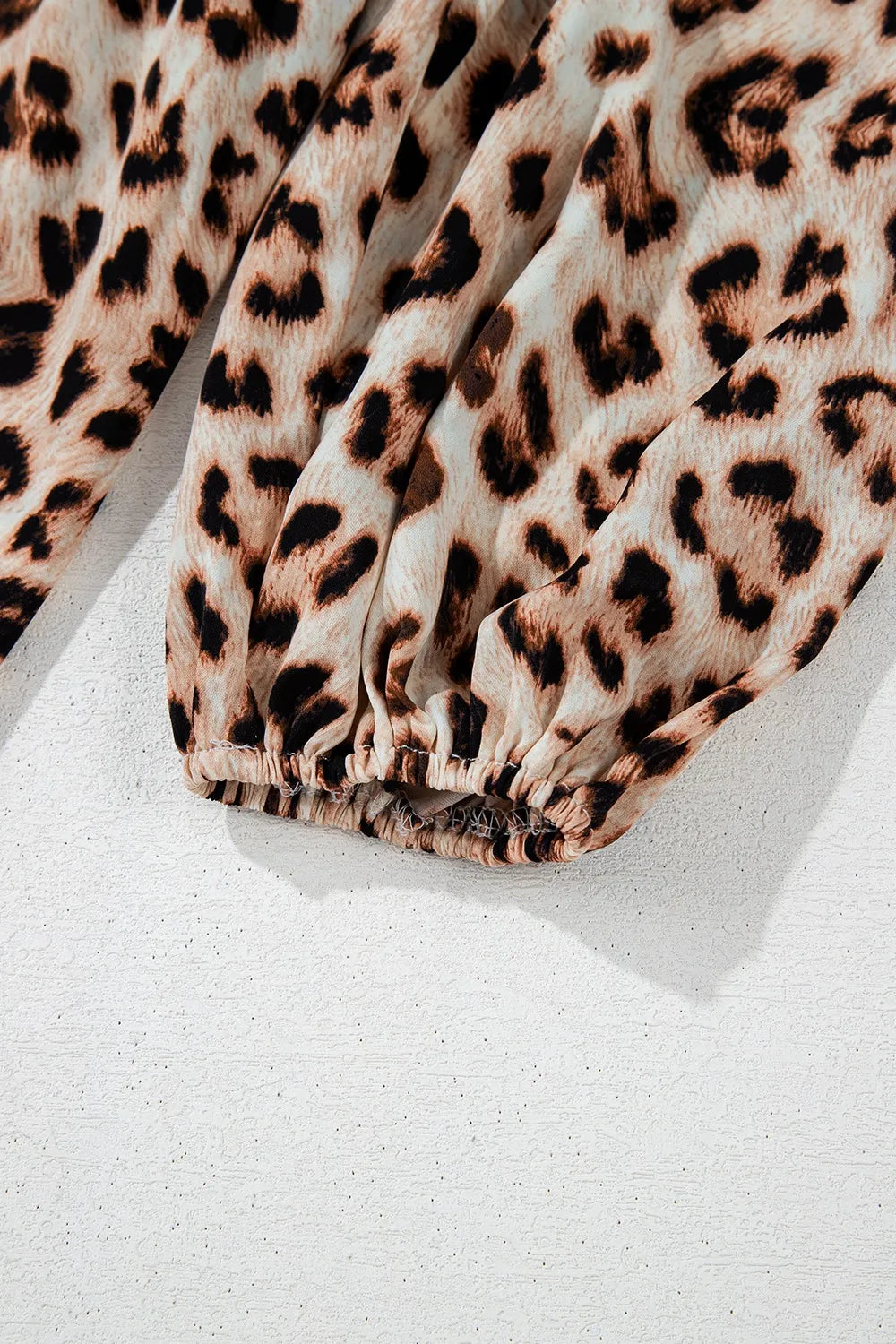 Leopard Print V-Neck Blouse with Contrast Trim