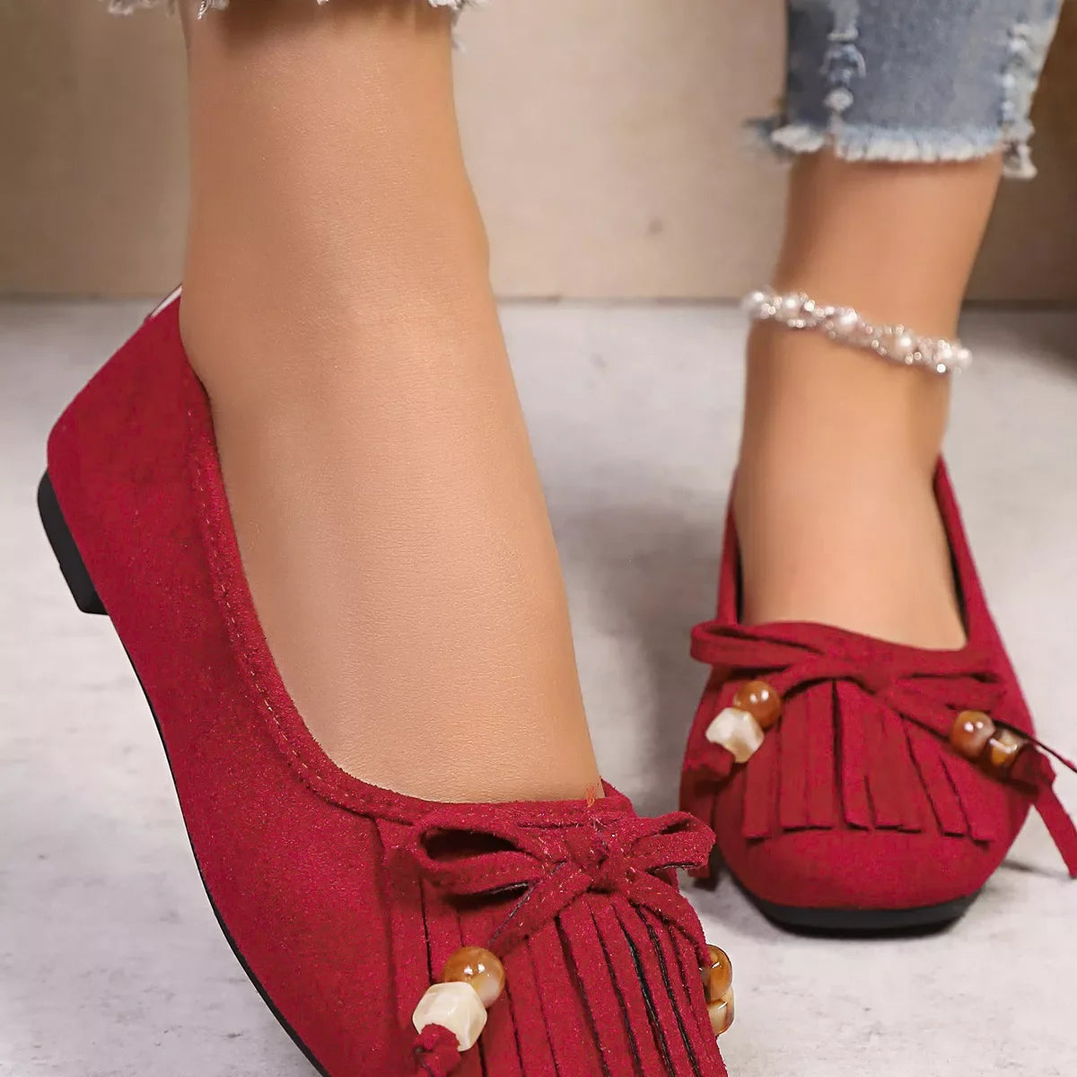 Suede Fringe Slip-Ons