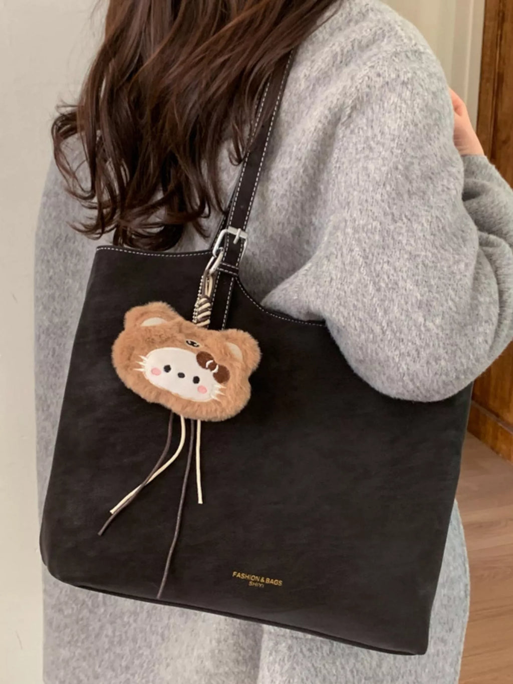 Solid Color Handbag with Plush Charm