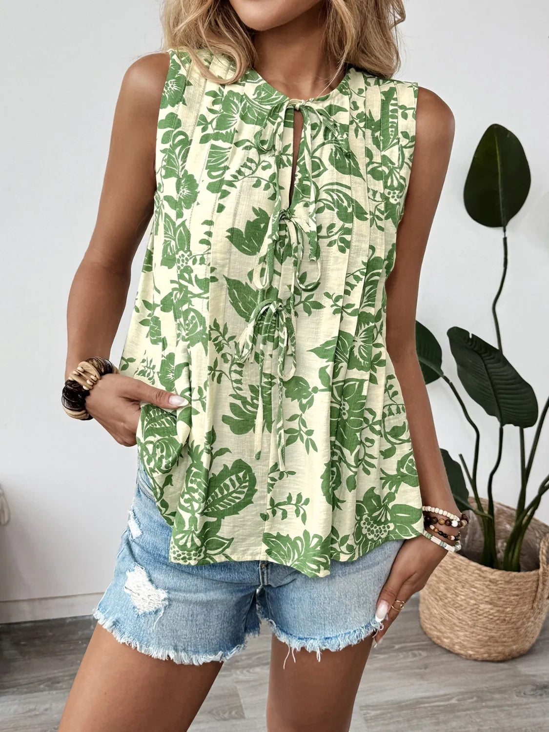 Printed Sleeveless Ruffle Peplum Blouse