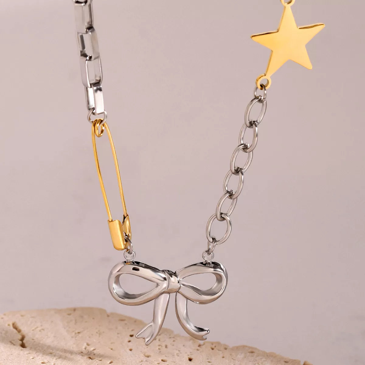 Two-Tone Bow Star Necklace
