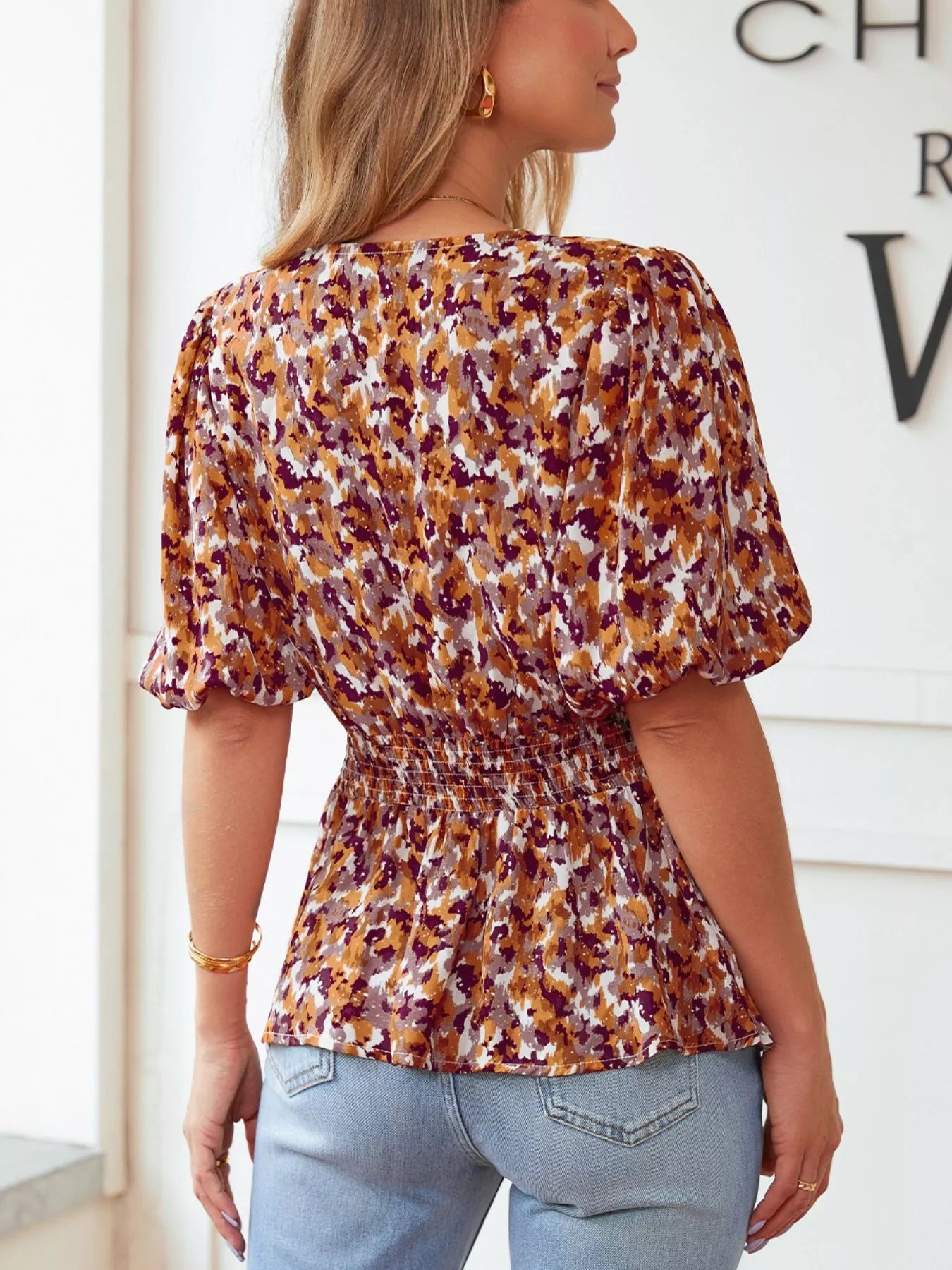 Abstract Print V Neck Smocked Babydoll Blouse
