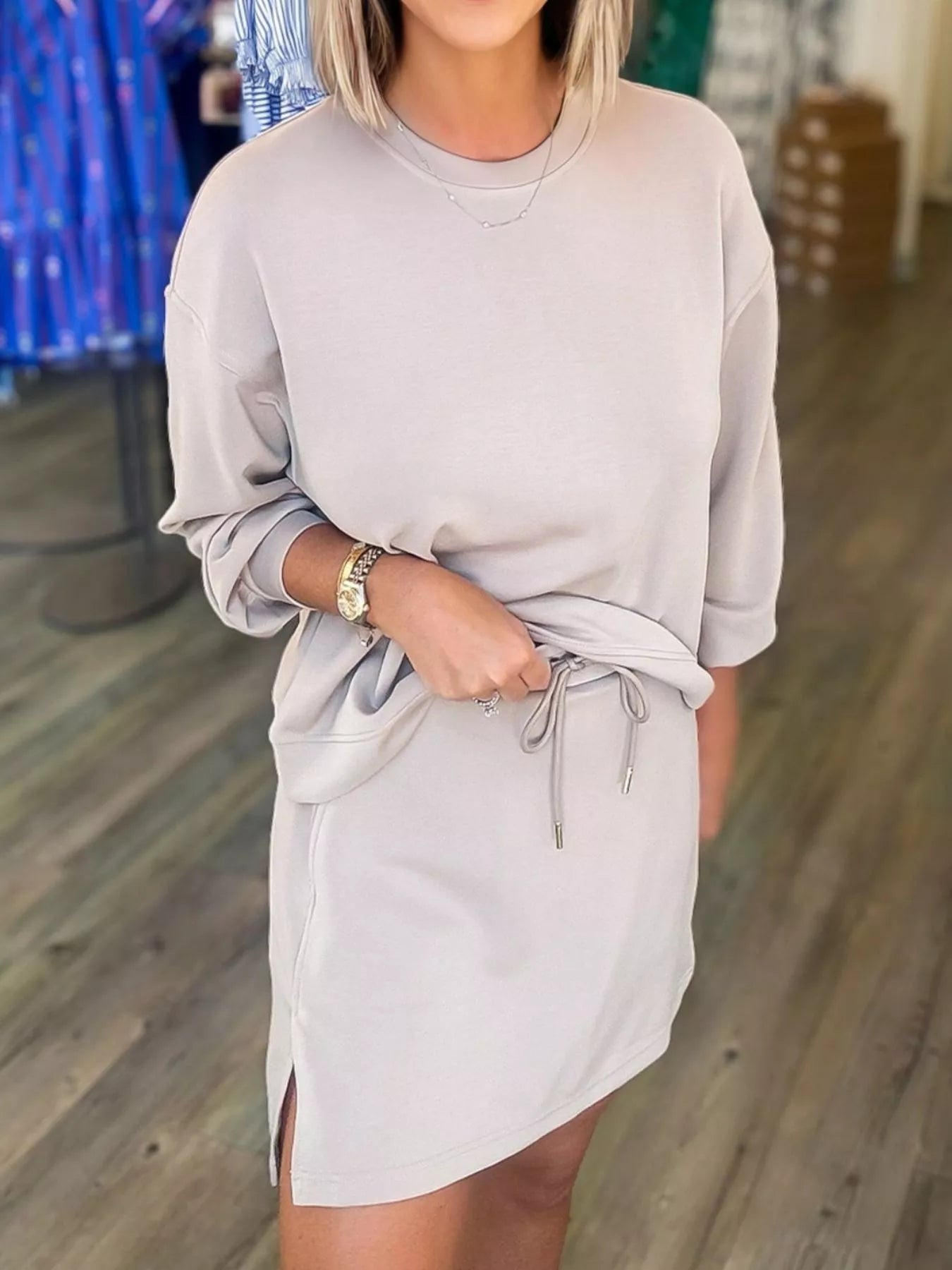 Solid Color Drop Shoulder Pullover and Drawstring Mini Skirt 2pcs Outfit