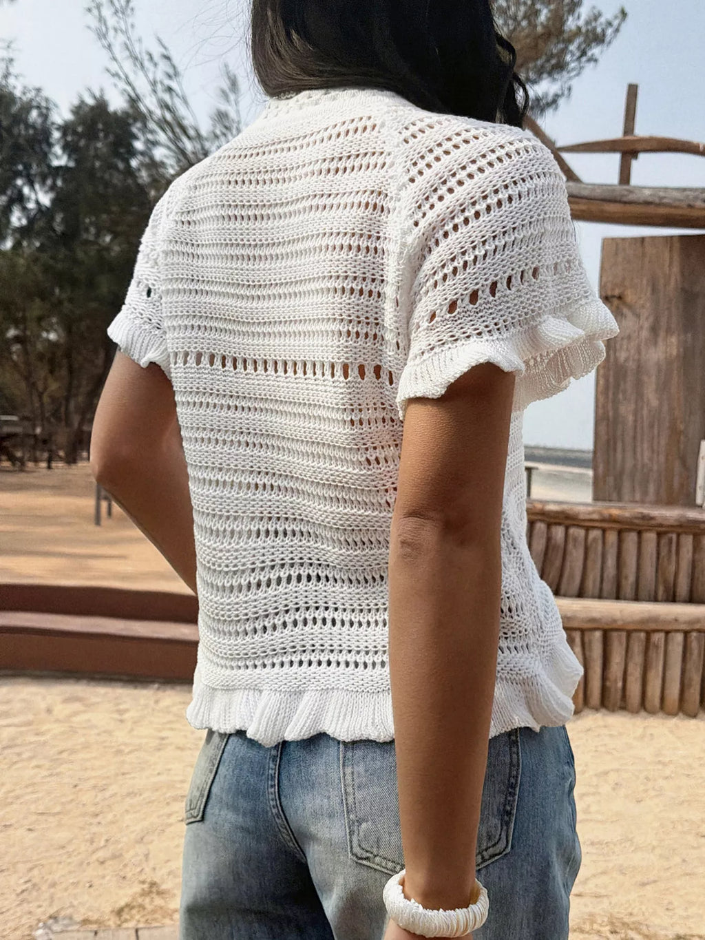 Openwork Ruffled Hem Knit Top