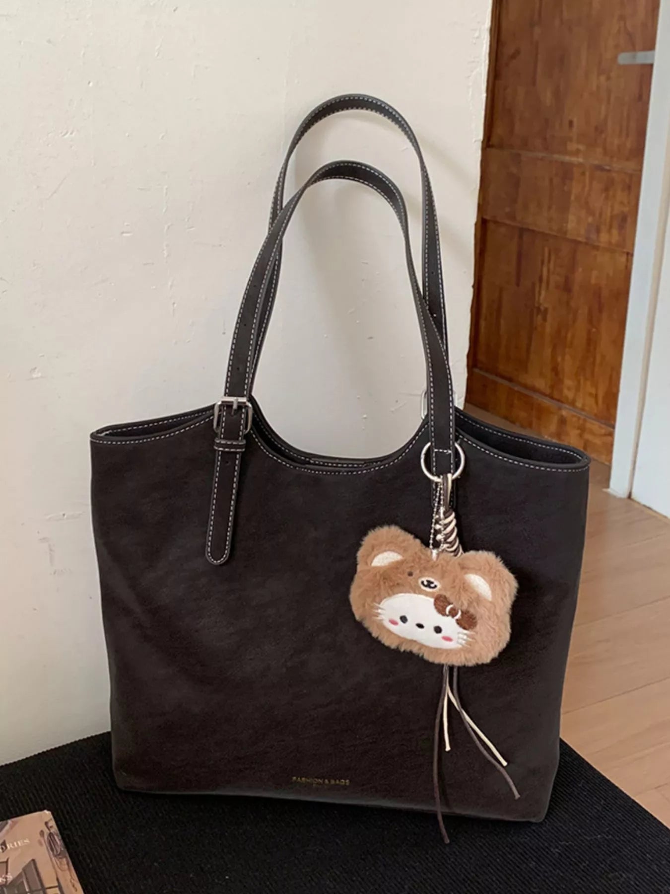 Solid Color Handbag with Plush Charm